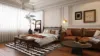 Stilvolles Schlafzimmer design aus der Mitte des Jahrhunderts mit einem gemütlichen Bett und einem in Homes tyler kreierten Chesterfield-Sofa aus Leder.