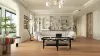 Elegantes zeitgenössisches Wohnzimmer design mit einem kurvigen Sofa und einem modernen Couch tisch in Homes tyler